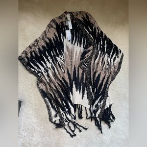 Knit autumn-colored ruana from Chico’s | elegant shawl | shimmery | fringed